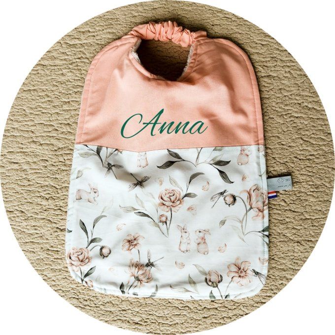 bavoir cantine motifs lapin 2 unis corail éponge rose